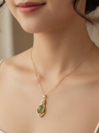 Gilded Emerald Pendant Necklace